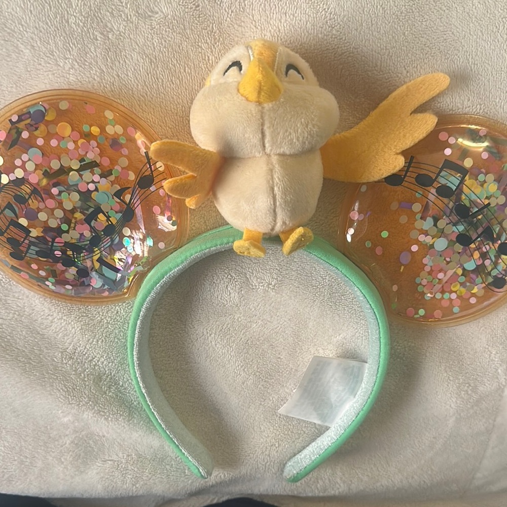 Cute  yellow plush bird Headband with Glitter  musical Ears from Disney.